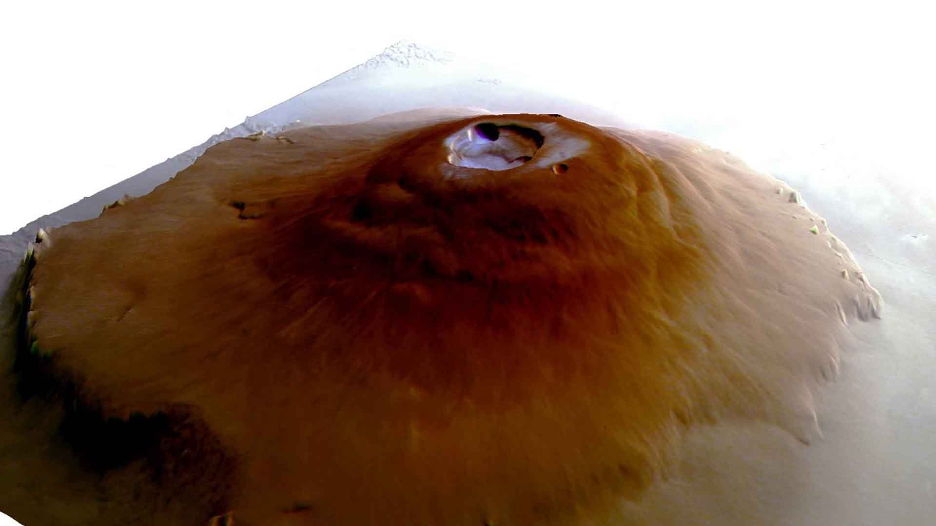 رصد طبقة من الصقيع على قمم براكين المريخ العملاقة